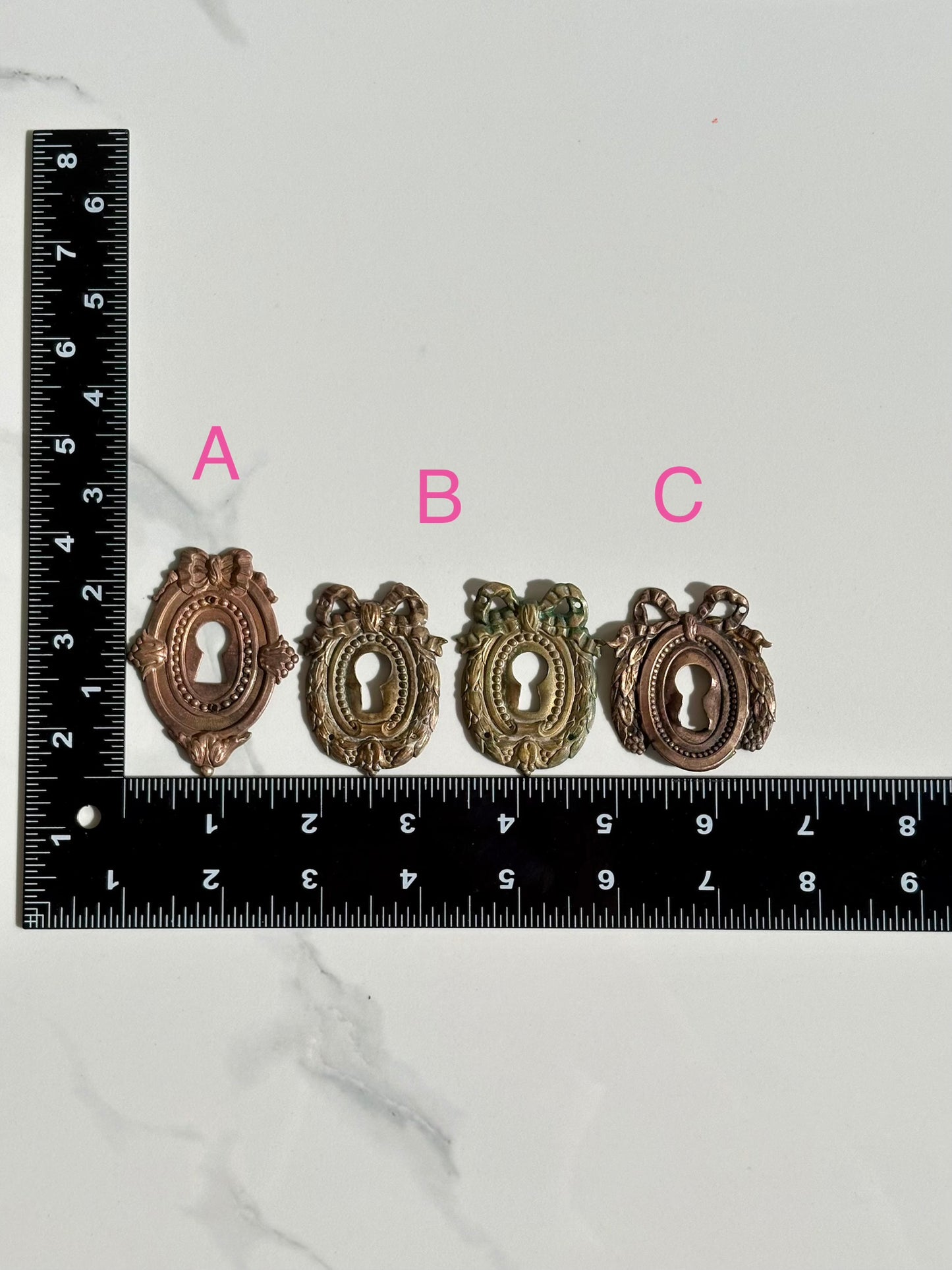 Bow Escutcheons