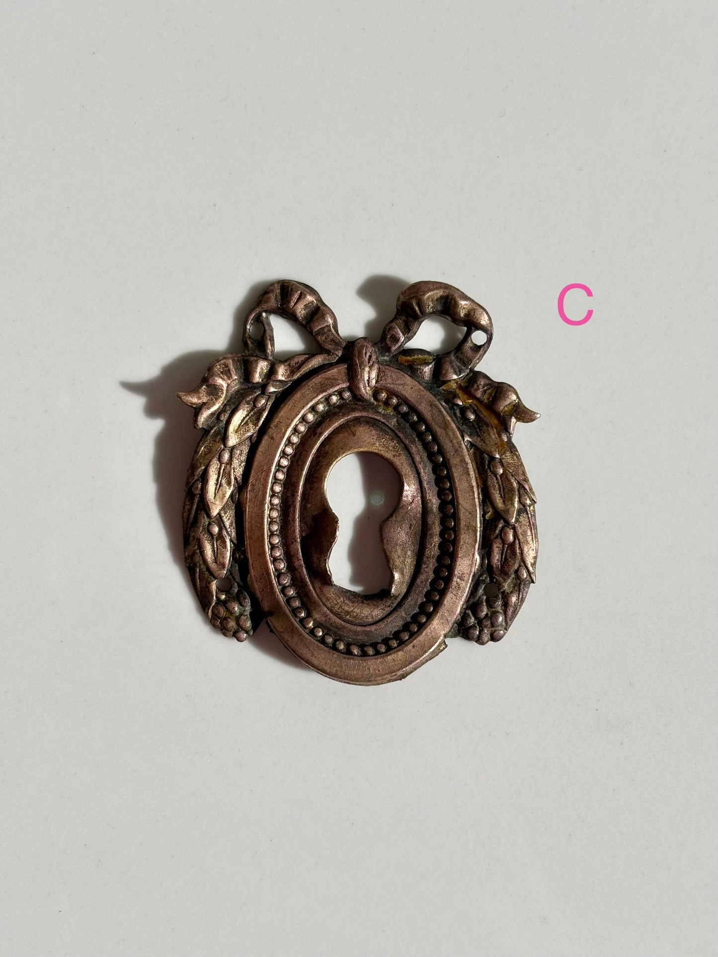 Bow Escutcheons