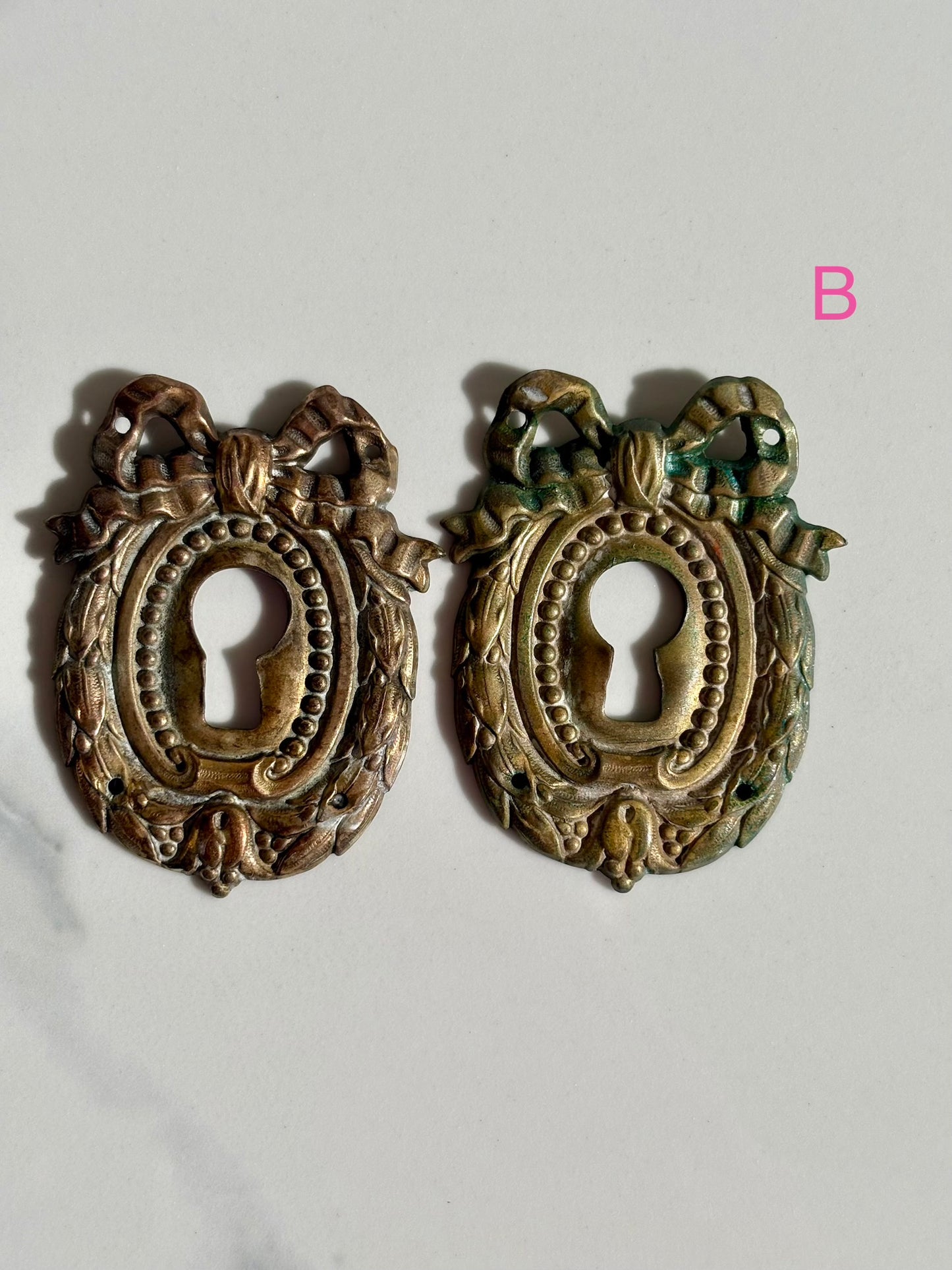 Bow Escutcheons