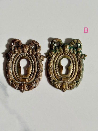 Bow Escutcheons