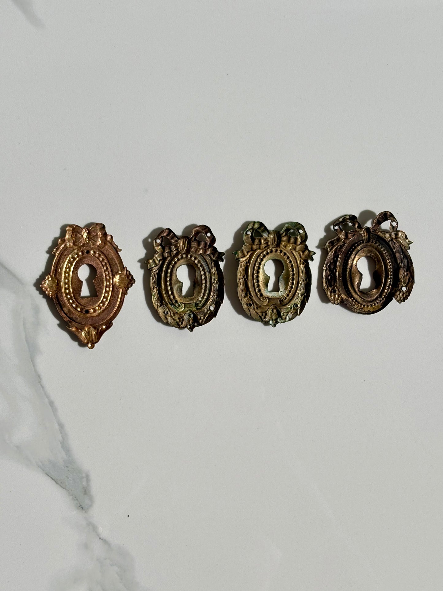 Bow Escutcheons
