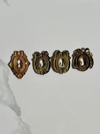Bow Escutcheons