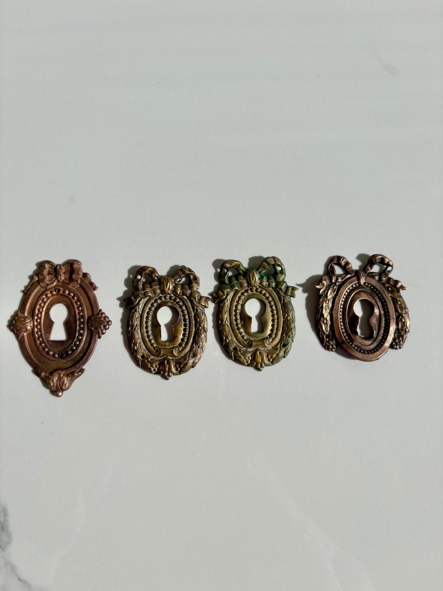 Bow Escutcheons
